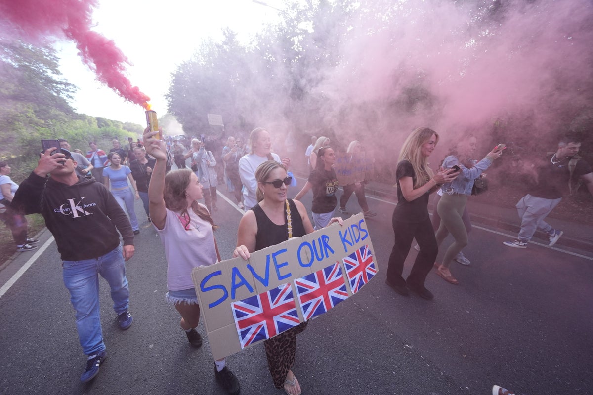 Bottles and flares thrown during another protest outside Essex hotel