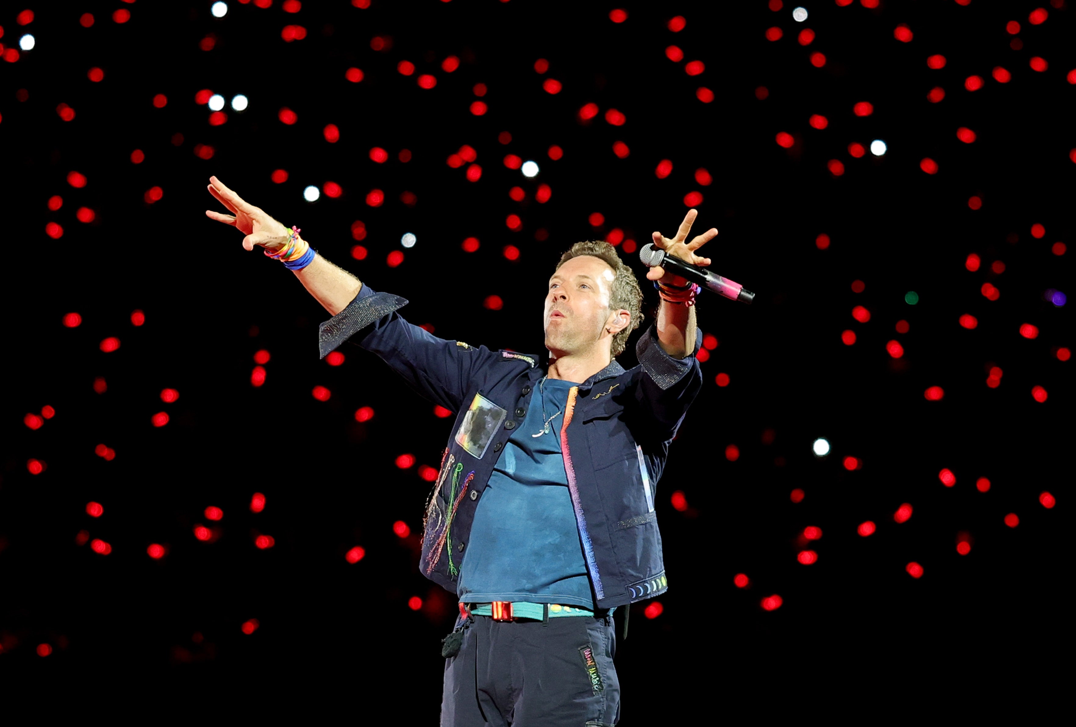 ‘How we're gonna do that is we're gonna use our cameras and put some of you on the big screen,’ Martin explained to the crowd on Saturday