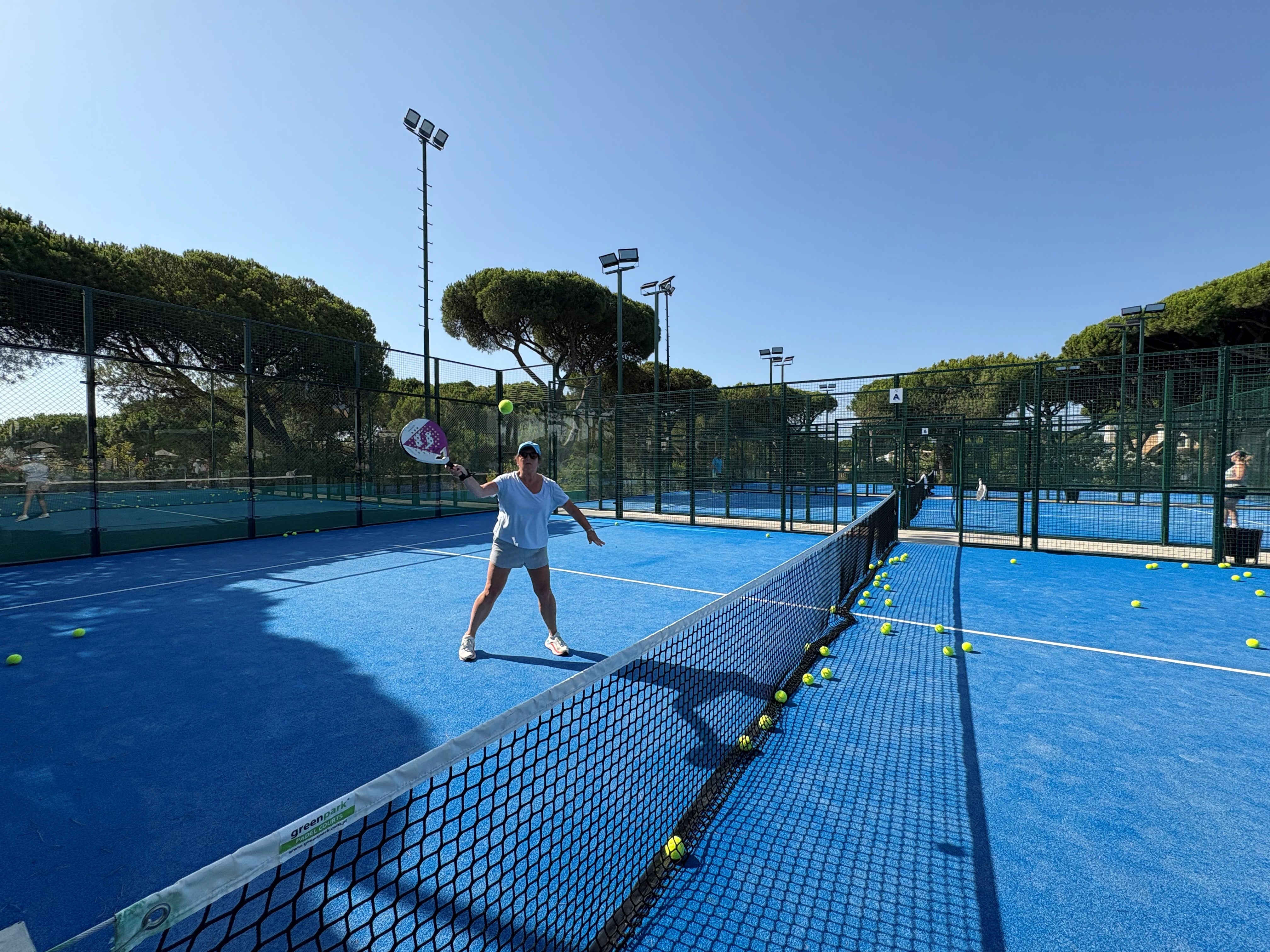 Hannah Learning Padel in one of the new courts in Pine Cliffs