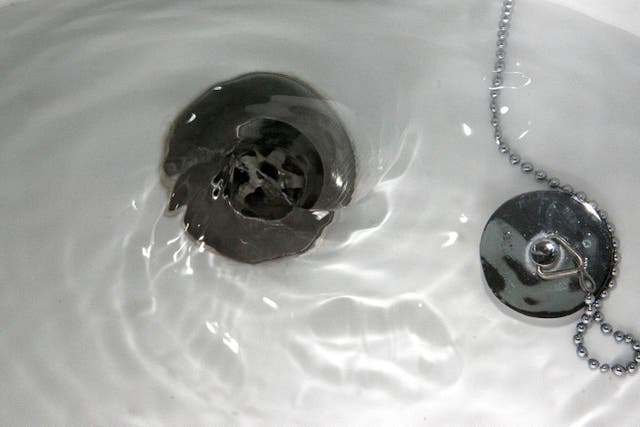 The report recommends compulsory water metering (Peter Byrne/PA)