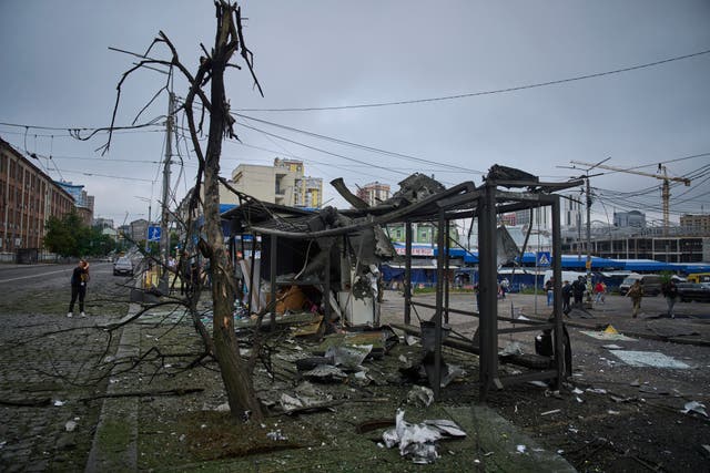 <p>A bus stop is seen damaged by a Russian attack in Kyiv</p>