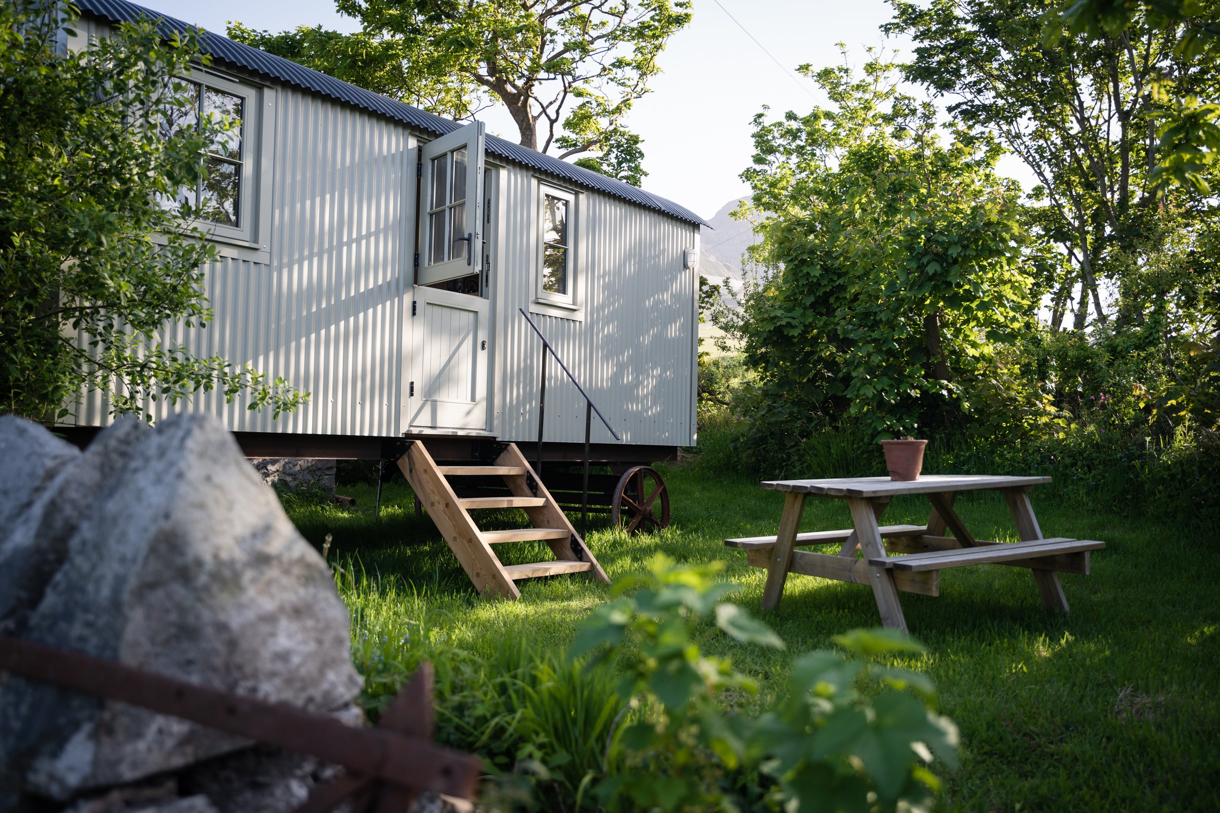Bert's Kitchen Garden is set in wildflower meadows on the Llyn Peninsula in Wales, with no wifi but treehouses and plenty of space for children to roam