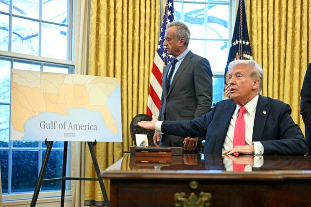 <p>President Donald Trump gestures to a 'Gulf of America' graphic in the Oval Office. The U.S. Geological Survey, a federal agency in charge of the country's geographic names, told its staff not to respond to journalists' questions after Trump first announced the change, a new report reveals.</p>