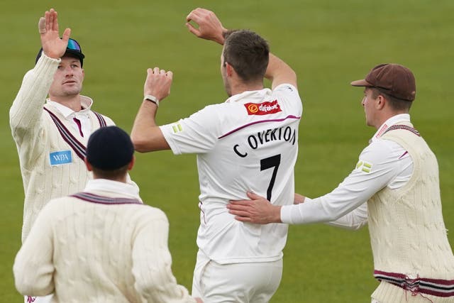 Craig Overton (centre) starred as Somerset skittled Durham (Joe Giddens/PA)