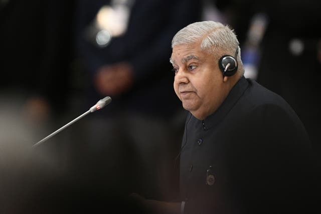 <p>India's Vice President Jagdeep Dhankhar takes part in the ASEAN-India Summit as part of the 40th and 41st Association of Southeast Asian Nations (ASEAN) Summits in Phnom Penh on November 12, 2022. (Photo by Nhac NGUYEN / AFP) (Photo by NHAC NGUYEN/AFP via Getty Images)          </p>