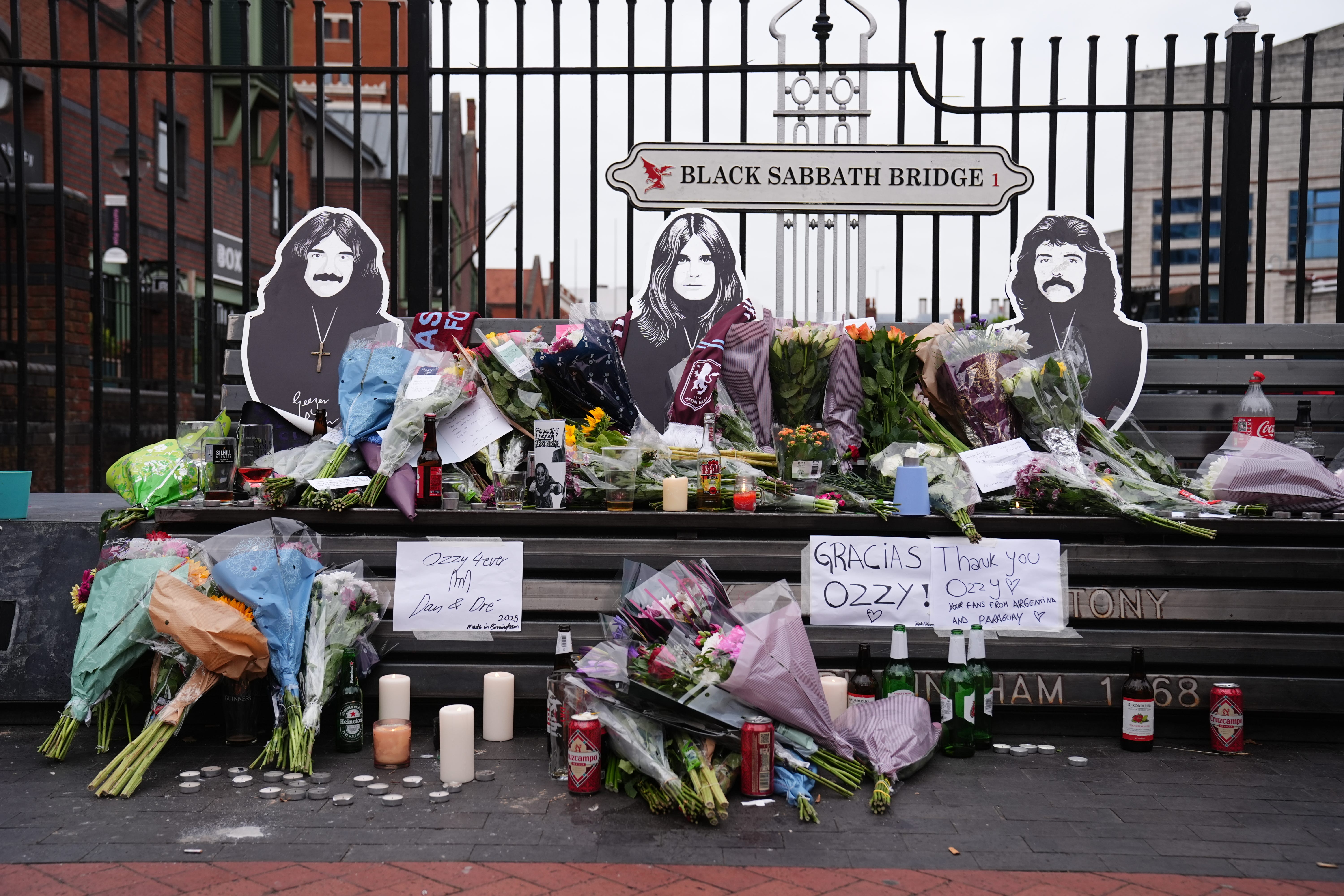 Floral tributes are left on the Black Sabbath Bridge bench on Broad Street in Birmingham, following the death of Black Sabbath frontman Ozzy Osbourne aged 76. Picture date: Wednesday July 23, 2025.