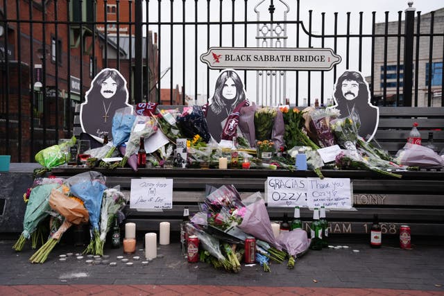 Floral tributes are left on the Black Sabbath Bridge bench on Broad Street in Birmingham, following the death of Black Sabbath frontman Ozzy Osbourne aged 76. Picture date: Wednesday July 23, 2025.