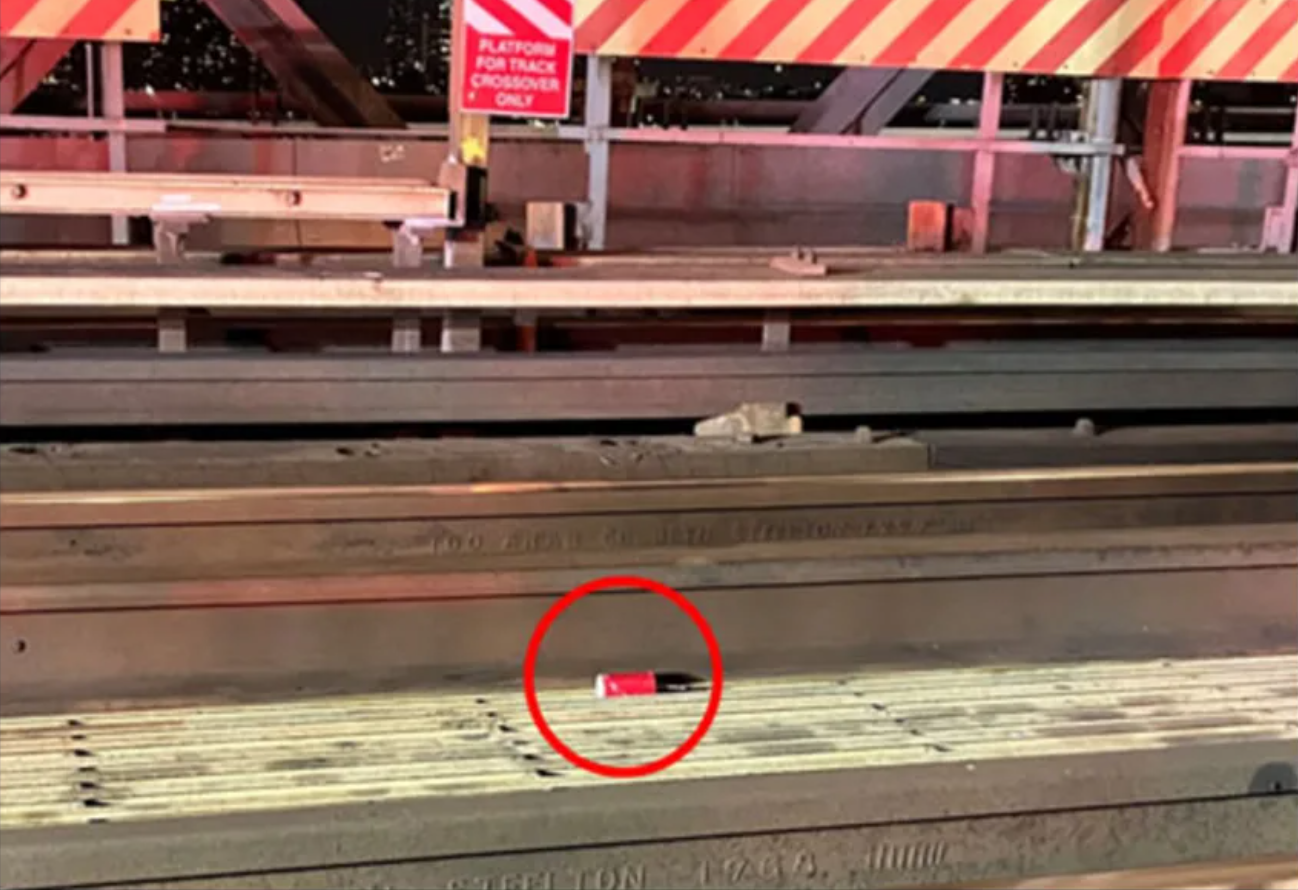 An improvised explosive device allegedly built and placed by Michael Gann on the subway tracks at the Williamsburg Bridge in New York City is visible inside the red circle.