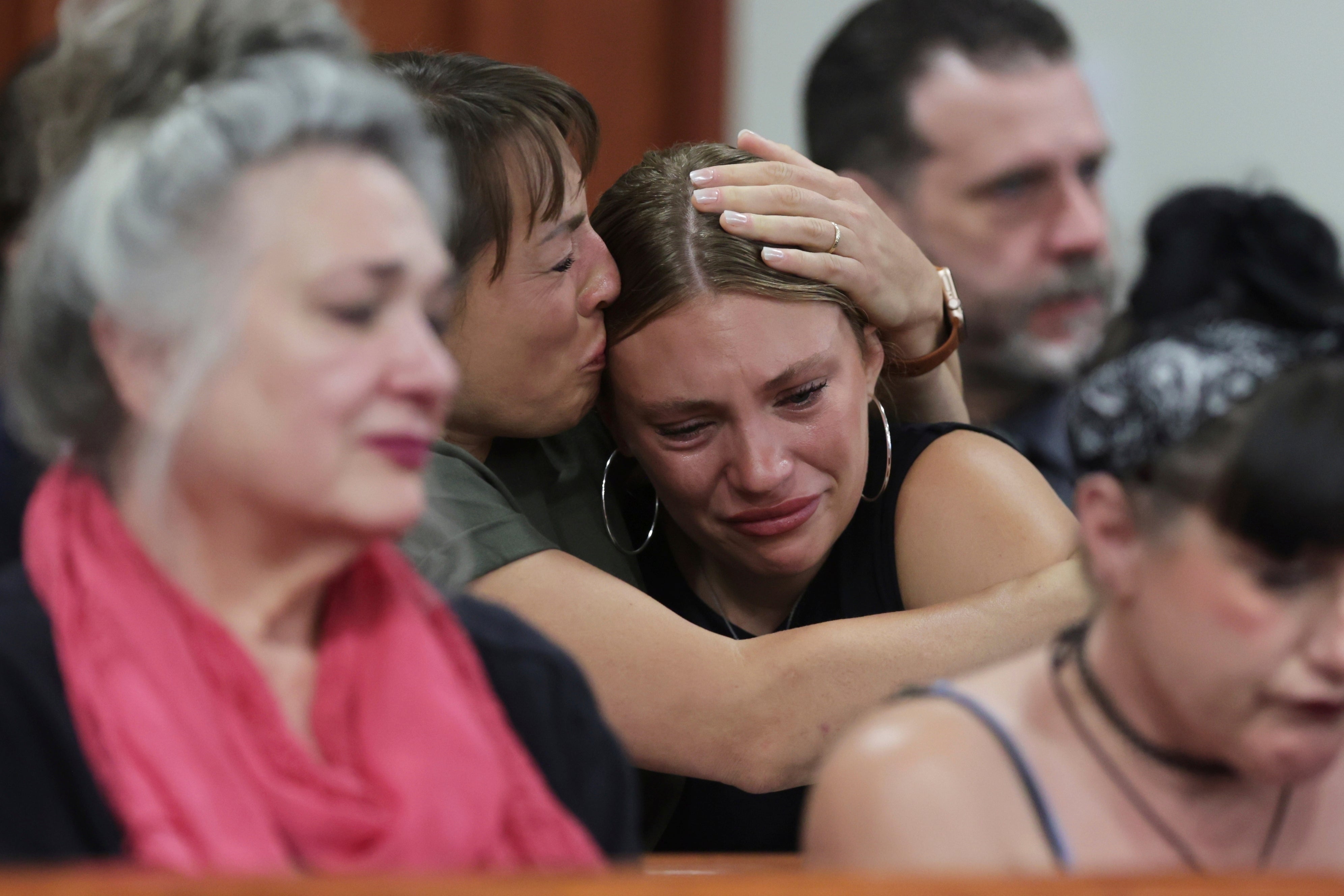 Dylan Mortensen, comforted by a loved one in the court, told Kohberger that he was “a hollow vessel, something less than human.”
