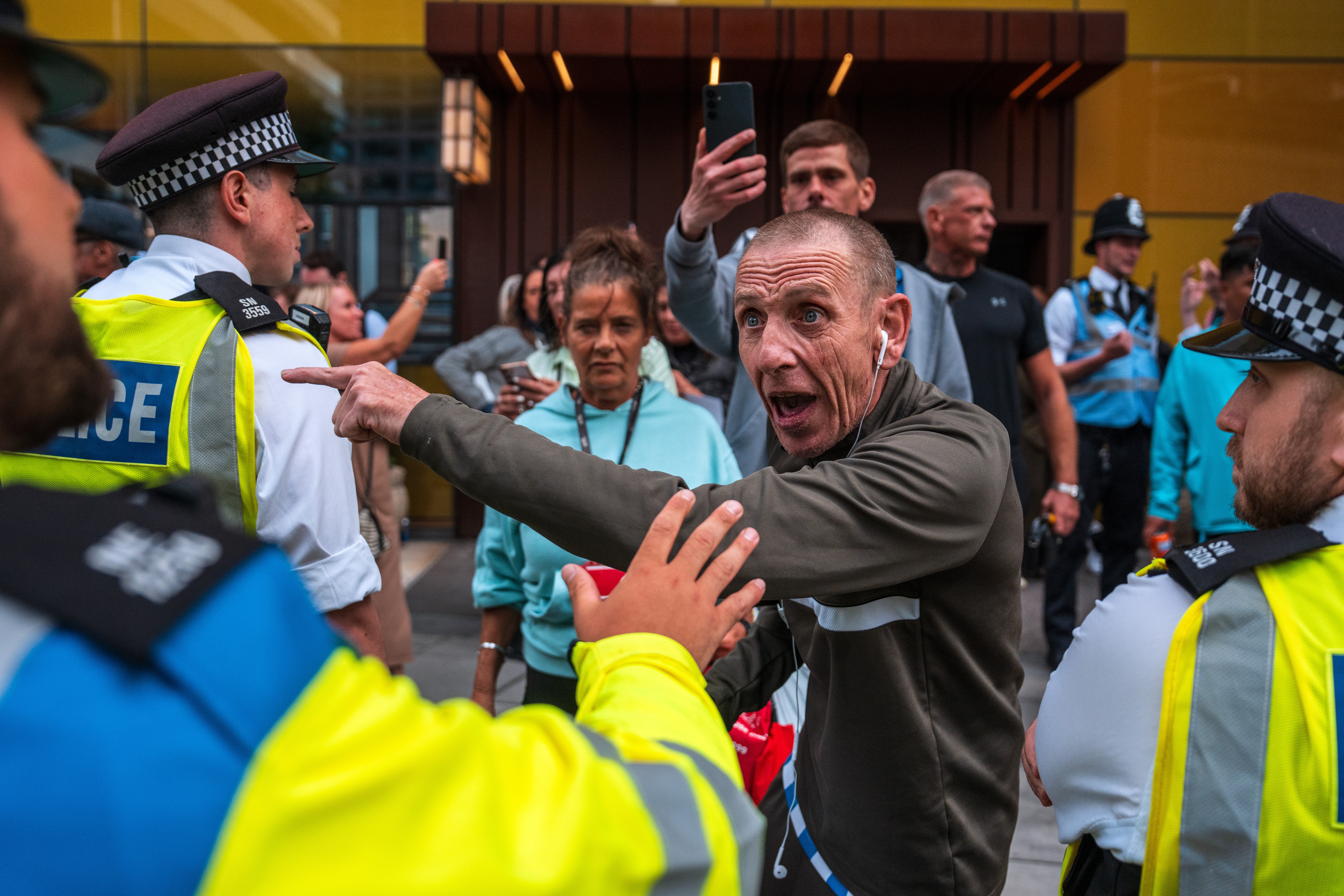 Protesters outside the Britannia Hotel in Canary Wharf