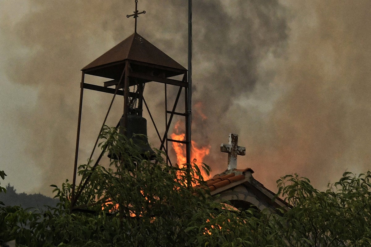 https://static.independent.co.uk/2025/07/23/6/02/Wildfire-burns-near-Corinth-tou62qw0.jpeg?trim=0,0,0,0&width=1200&height=800&crop=1200:800