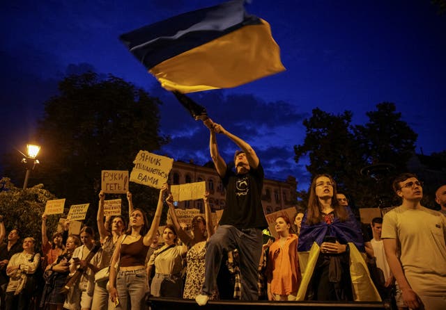 <p>Ukrainians protest in the first wartime rally against a newly passed law, which curbs independence of anti-corruption institutions, amid Russia’s attack on Ukraine</p>