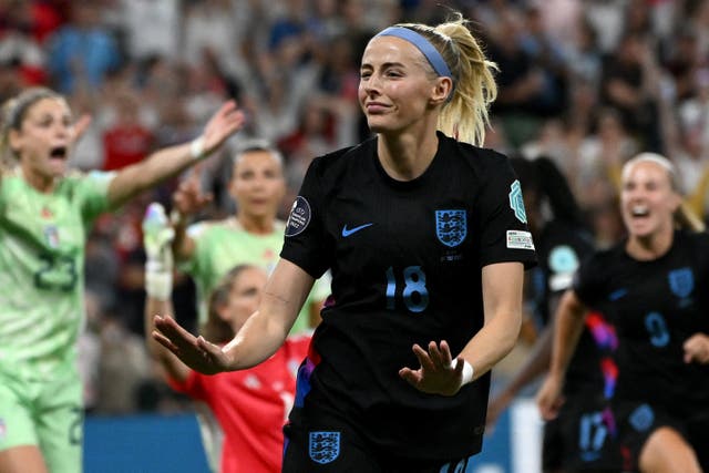 <p>Chloe Kelly celebrates after scoring England's match-winning goal</p>