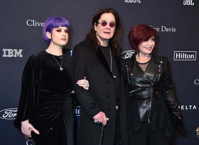 <p>Ozzy and Sharon with their daughter Kelly in 2020</p>