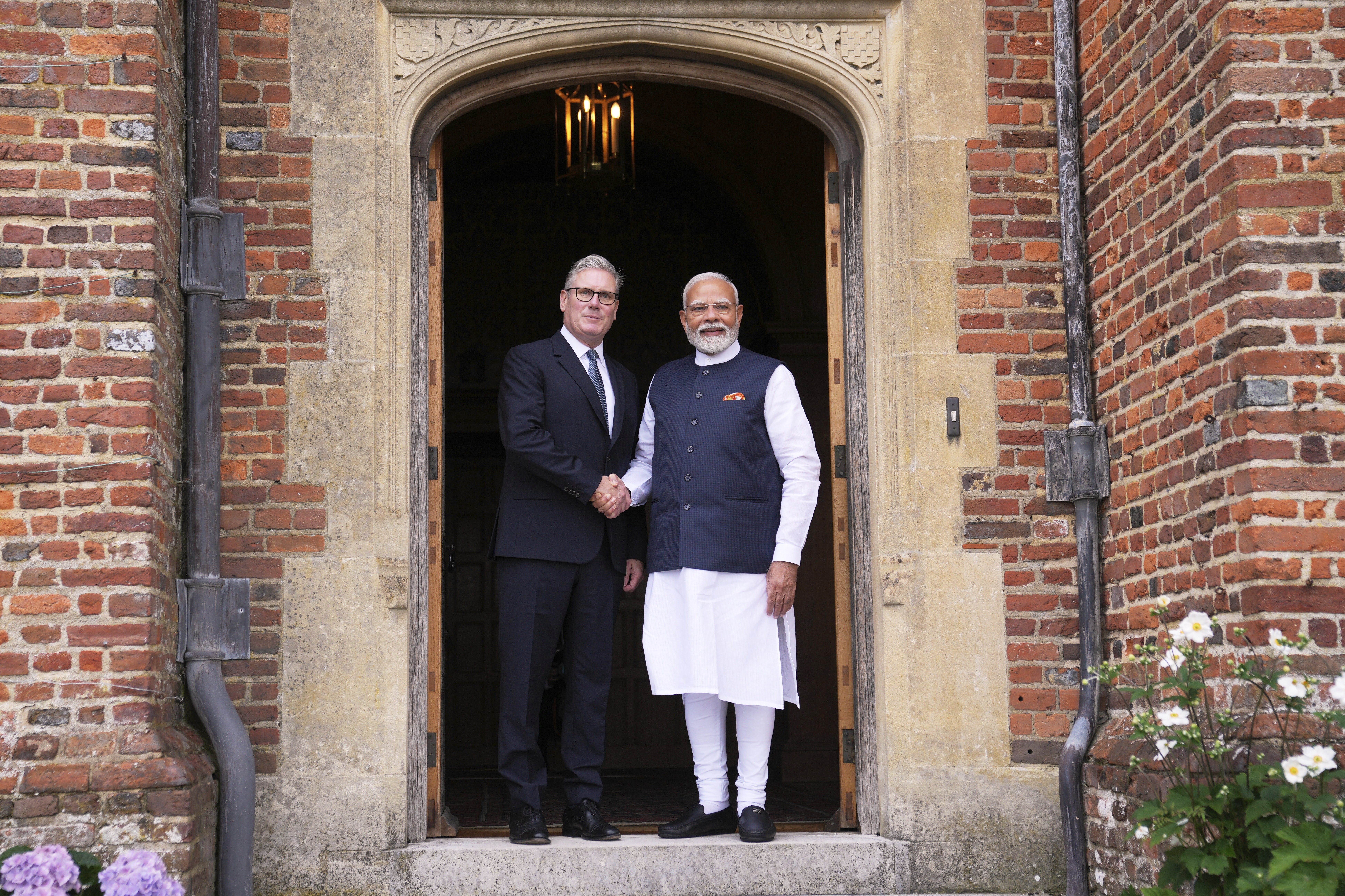 Prime Minister Sir Kir Stmper with Narendra Modi of India in checkers (Qin Chewn/PA)