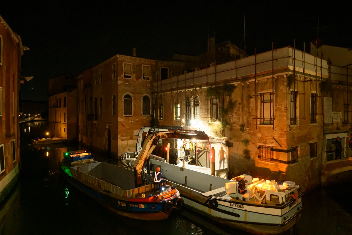 Bansky work 'The Migrant Child' removed from Venetian palazzo for restoration and future display