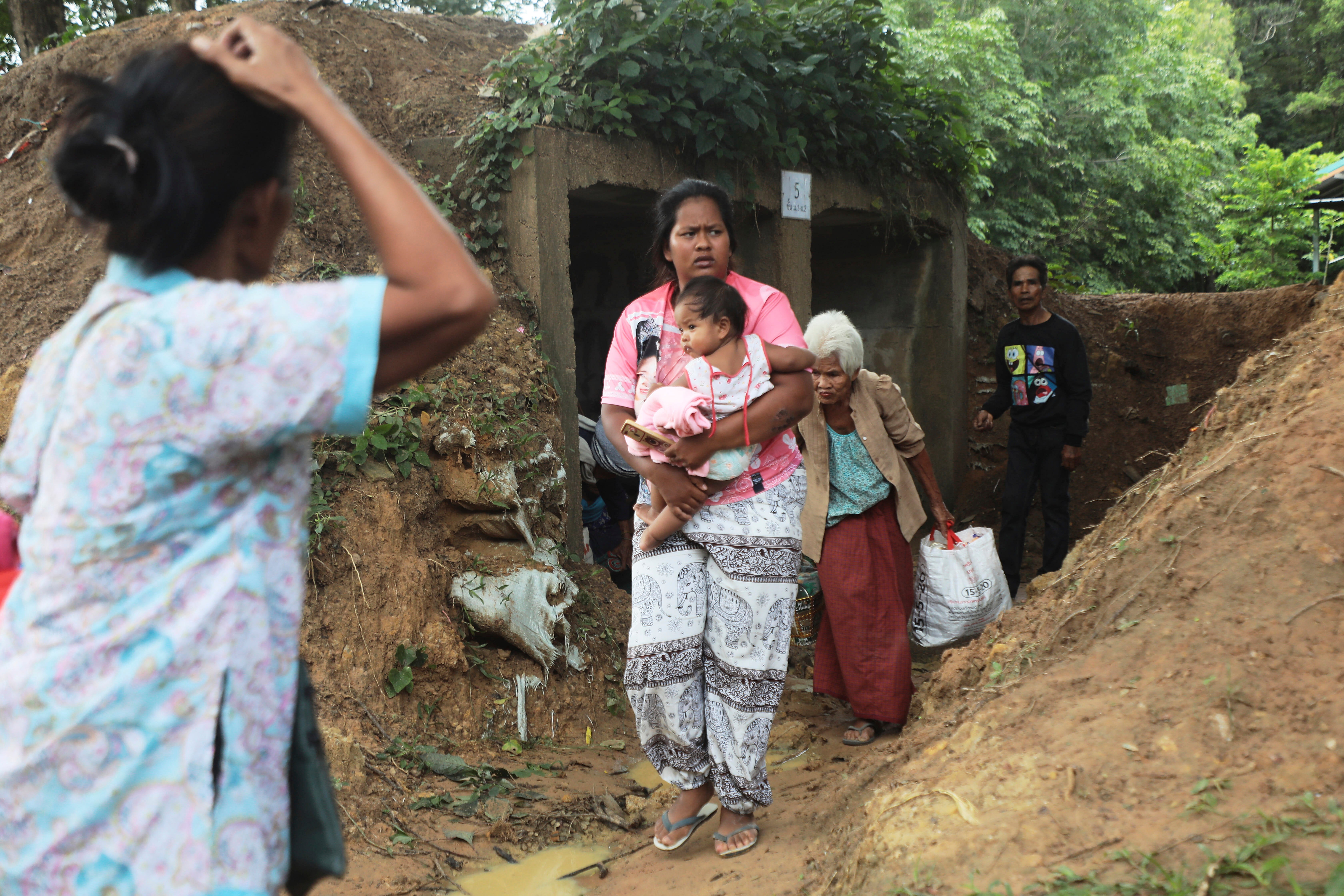 People fleeing clashes between Thai and Cambodian soldiers take shelter in Surin province, northeastern Thailand, on 24 July 2025