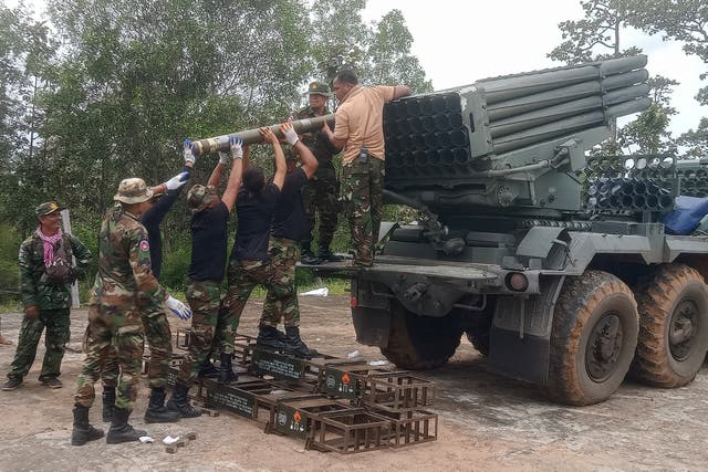 <p>Cambodian troops reload a multiple rocket launcher in Preah Vihear province on 24 July 2025</p>