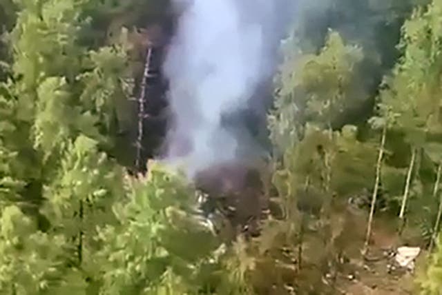 <p>This video grab from a handout footage released by the Eastern Interregional Directorate for Transport of the Russian Investigative Committee on 24 July 2025, shows an aerial view of the crash site of the Antonov AN-24 passenger plane outside the town of Tynda in Russia's far eastern Amur region</p>