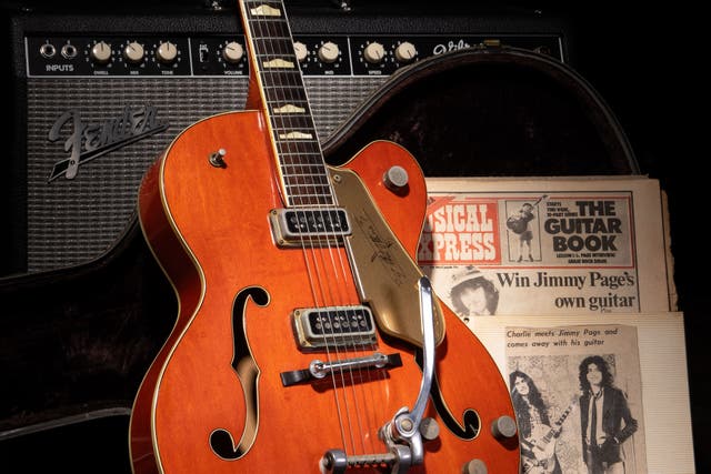 A guitar given away by Led Zeppelin’s Jimmy Page as a competition prize over 50 years ago could sell for £50,000 when it comes up for auction (Gardiner Houlgate/PA)