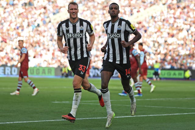 Dan Burn, left, hopes Alexander Isak stays with Newcastle amid reports he has asked to explore a move away (Bradley Collyer/PA)