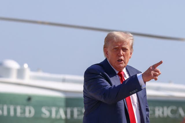 <p>U.S. President Donald Trump gestures after disembarking Marine One, as he departs for Scotland, at Joint Base Andrews, Maryland, U.S., July 25, 2025</p>