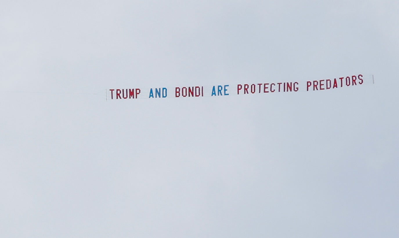 An airplane towing a banner that reads 'Trump and Bondi are protecting predators' flying over Tallahassee as Deputy Attorney General Todd Blanche meets with Ghislaine Maxwell, the imprisoned former girlfriend of financier and convicted sex offender Jeffrey Epstein