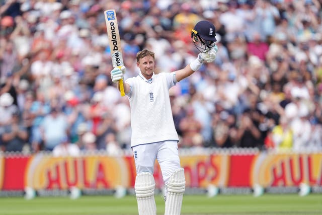 England’s Joe Root celebrates reaching his century (Martin Rickett/PA)