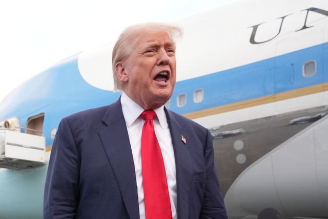 <p>Donald Trump speaks to the media after arriving in Scotland</p>