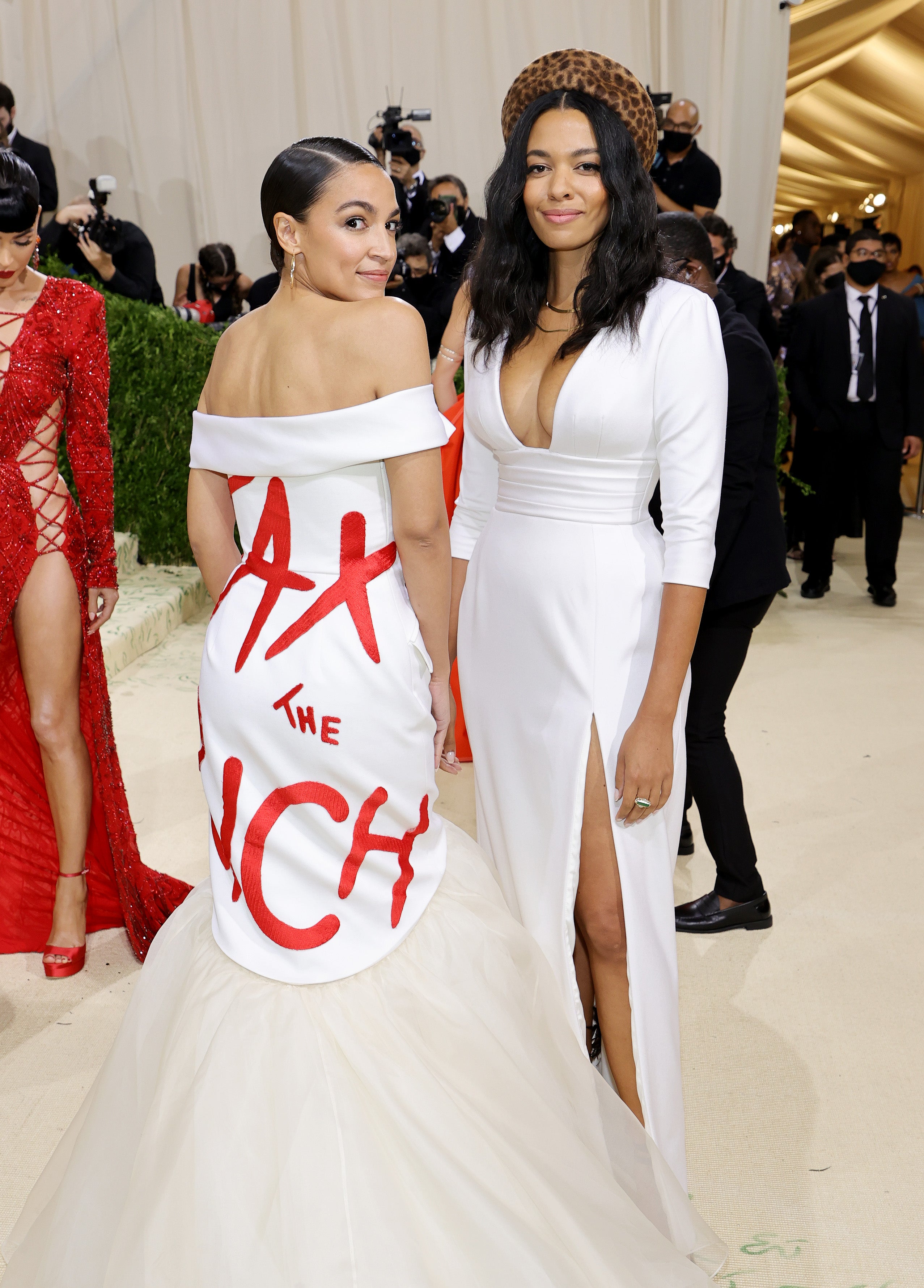 Ocasio-Cortez stunned onlookers with a Brother Vellies custom white mermaid gown that had the words ‘Tax the Rich’ in red on the back