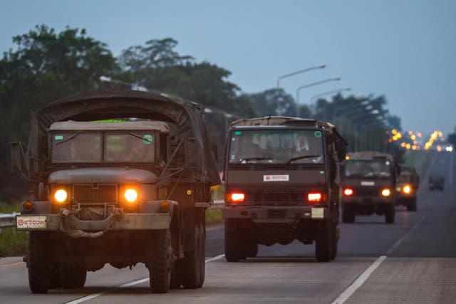 <p>Army vehicles drive along a road in Buriram province, after Thailand scrambled an F-16 fighter jet to bomb targets in Cambodia following artillery volleys from both sides that killed civilians</p>
