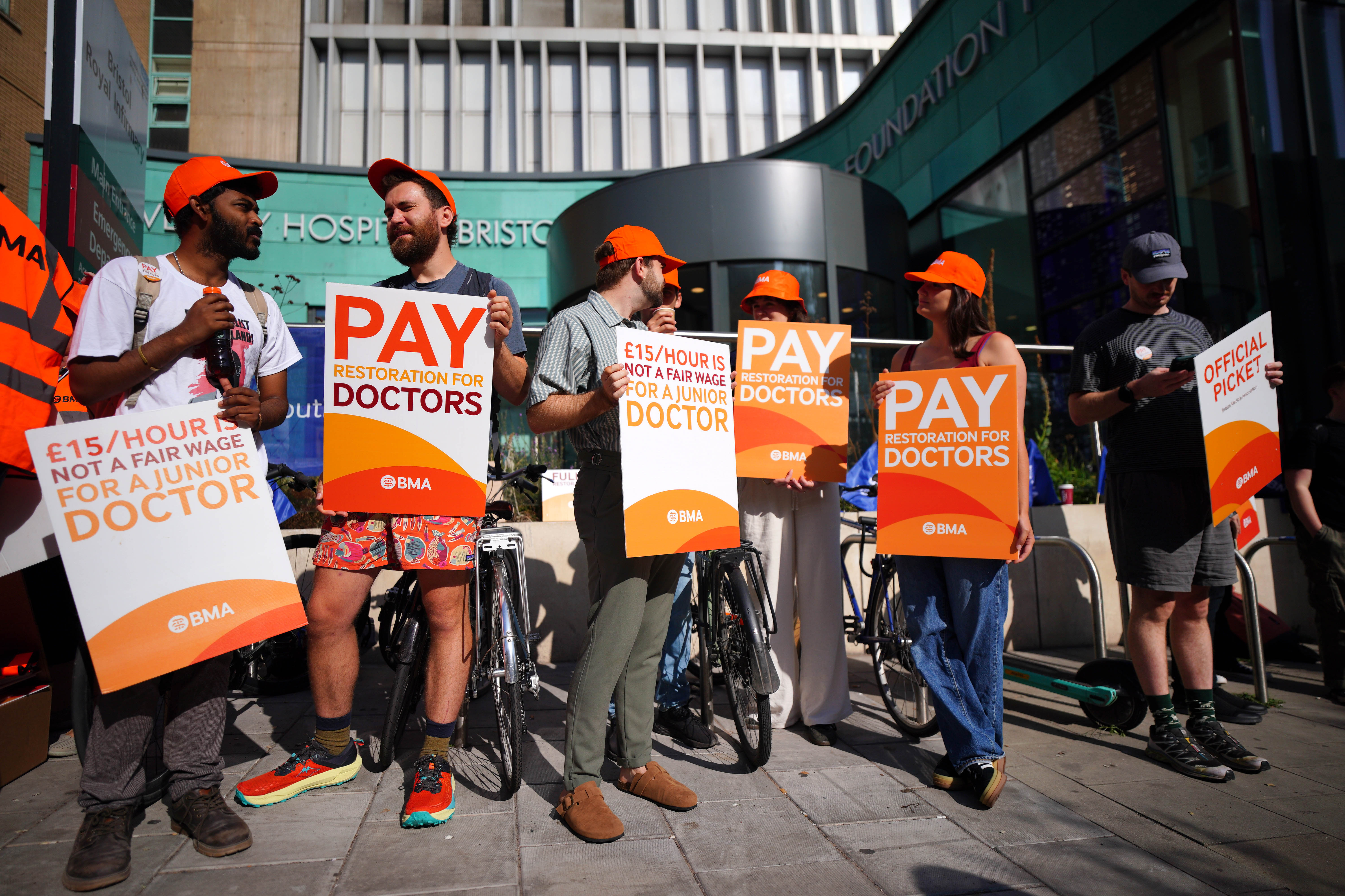 <p>NHS resident doctors outside Bristol Royal Infirmary, as resident doctors in England, formerly referred to as junior doctors, begin a five-day strike after talks with the Government collapsed over pay</p>