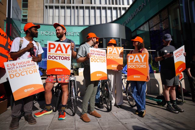 <p>NHS resident doctors outside Bristol Royal Infirmary, as resident doctors in England, formerly referred to as junior doctors, begin a five-day strike after talks with the Government collapsed over pay</p>