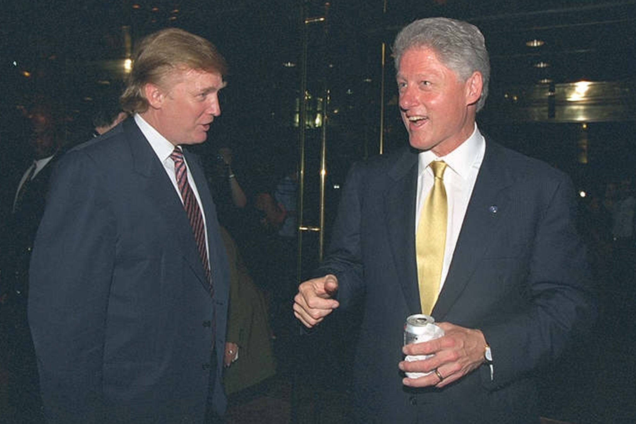 Former President Bill Clinton, pictured with President Donald Trump, is the latest high-profile figure who reportedly wrote a note in the birthday book to Epstein, according to the Journal .