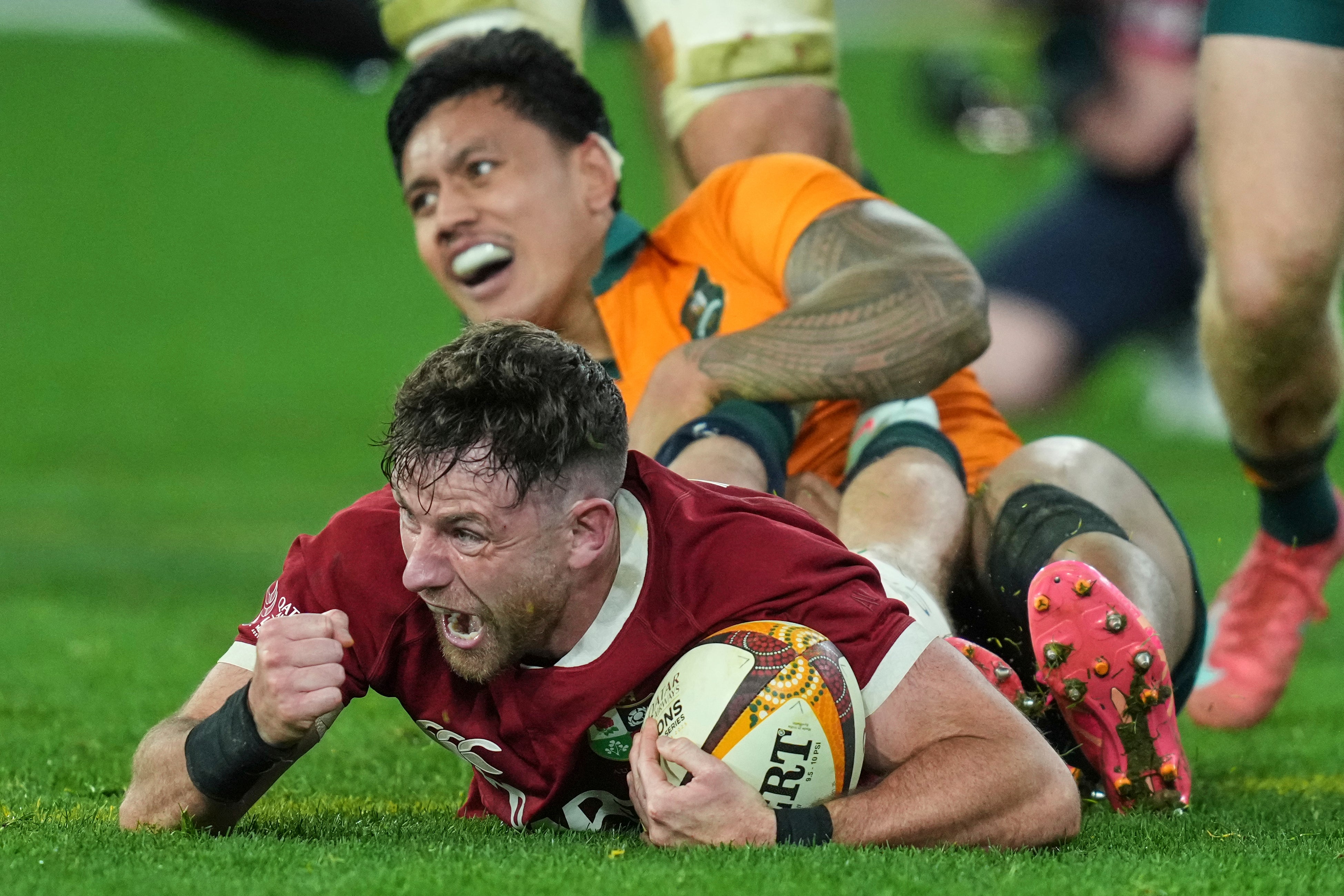Hugo Keenan of the British & Irish Lions celebrates after scoring the winning try