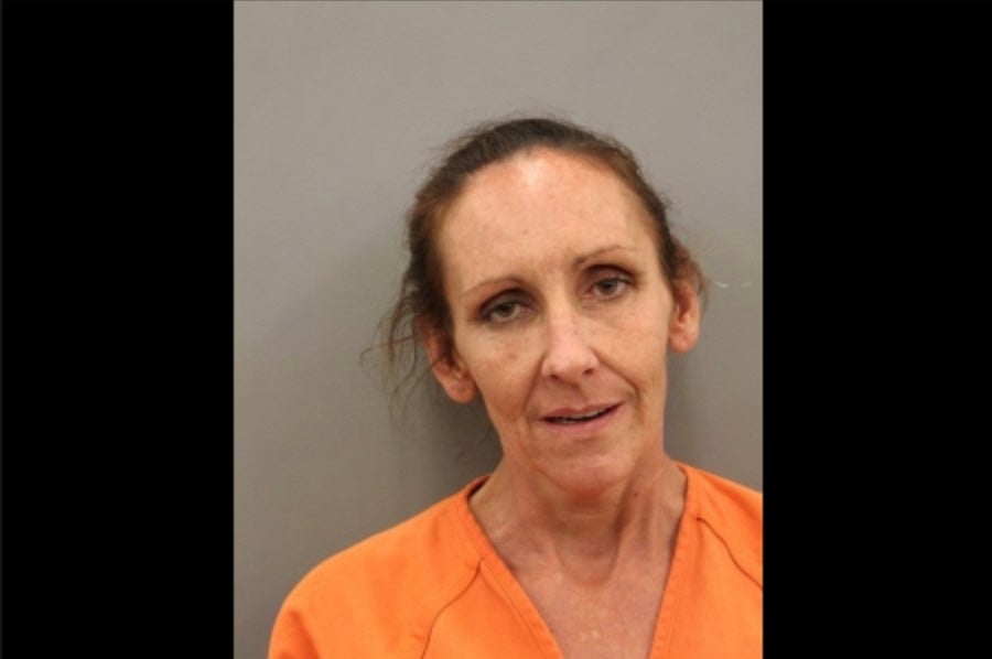 Amber McNulty, 43, is accused of fatally shooting a 75-year-old woman at an apartment complex as the victim picked up aluminum cans.