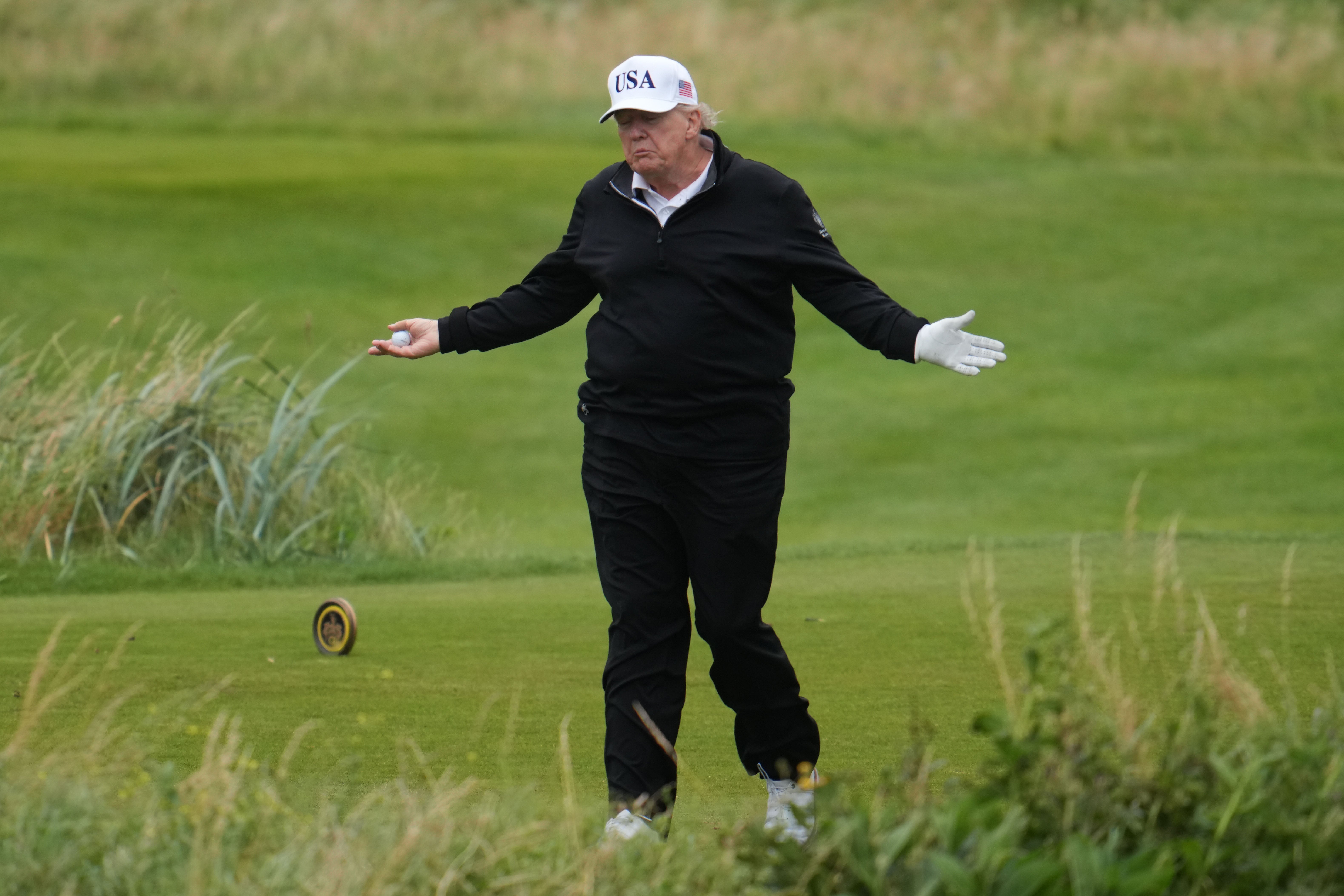 Donald Trump was happy by supporters to arrive at his turnberry golf resort