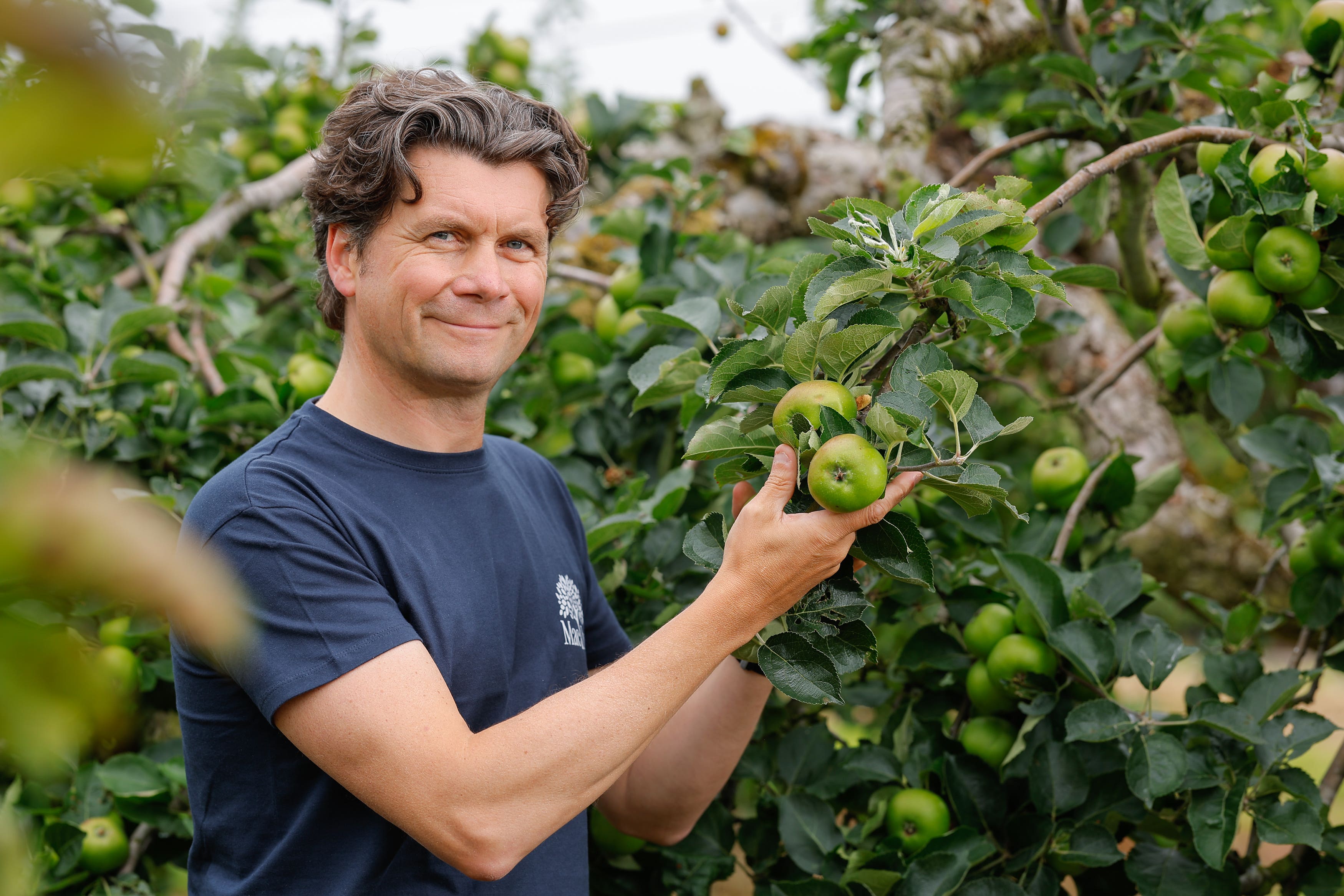Greg MacNeice, founder of Mac Ivors Cider, at the orchards at Ardress in Co Armagh (Philip Magowan/PA)