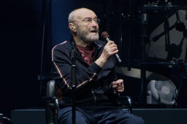 <p>Phil Collins' representative has said the 74-year-old singer is in the hospital after undergoing knee surgery </p>