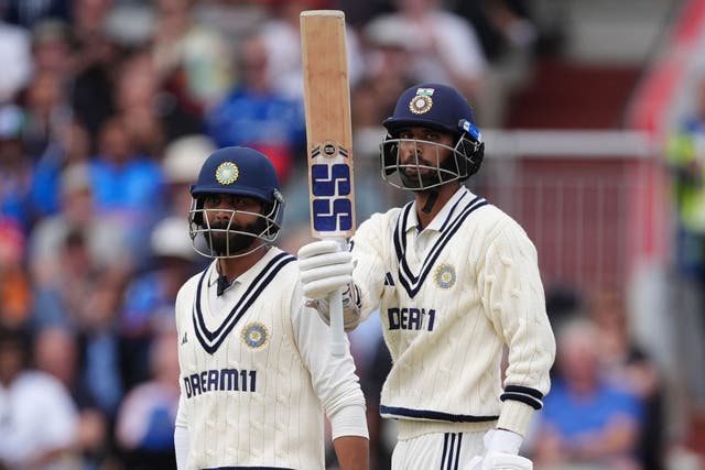 Washington Sundar, right, and Ravindra Jadeja, left, both reached their half-centuries in Manchester (Martin Rickett/PA)