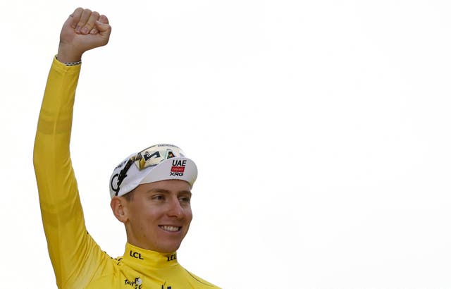 <p>Tadej Pogacar sealed victory by finishing in Paris</p>