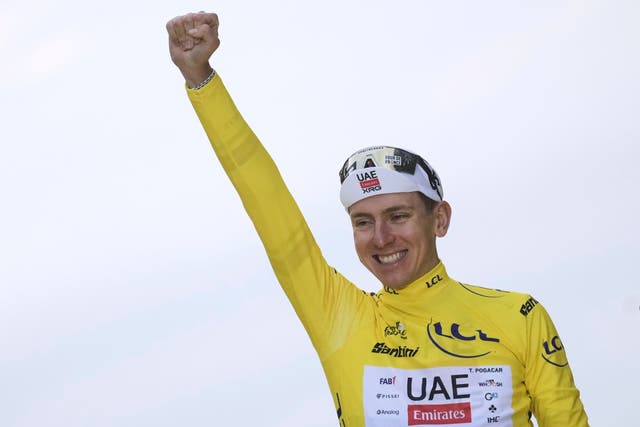 <p>Tadej Pogacar is back on the top step of the Tour de France podium</p>