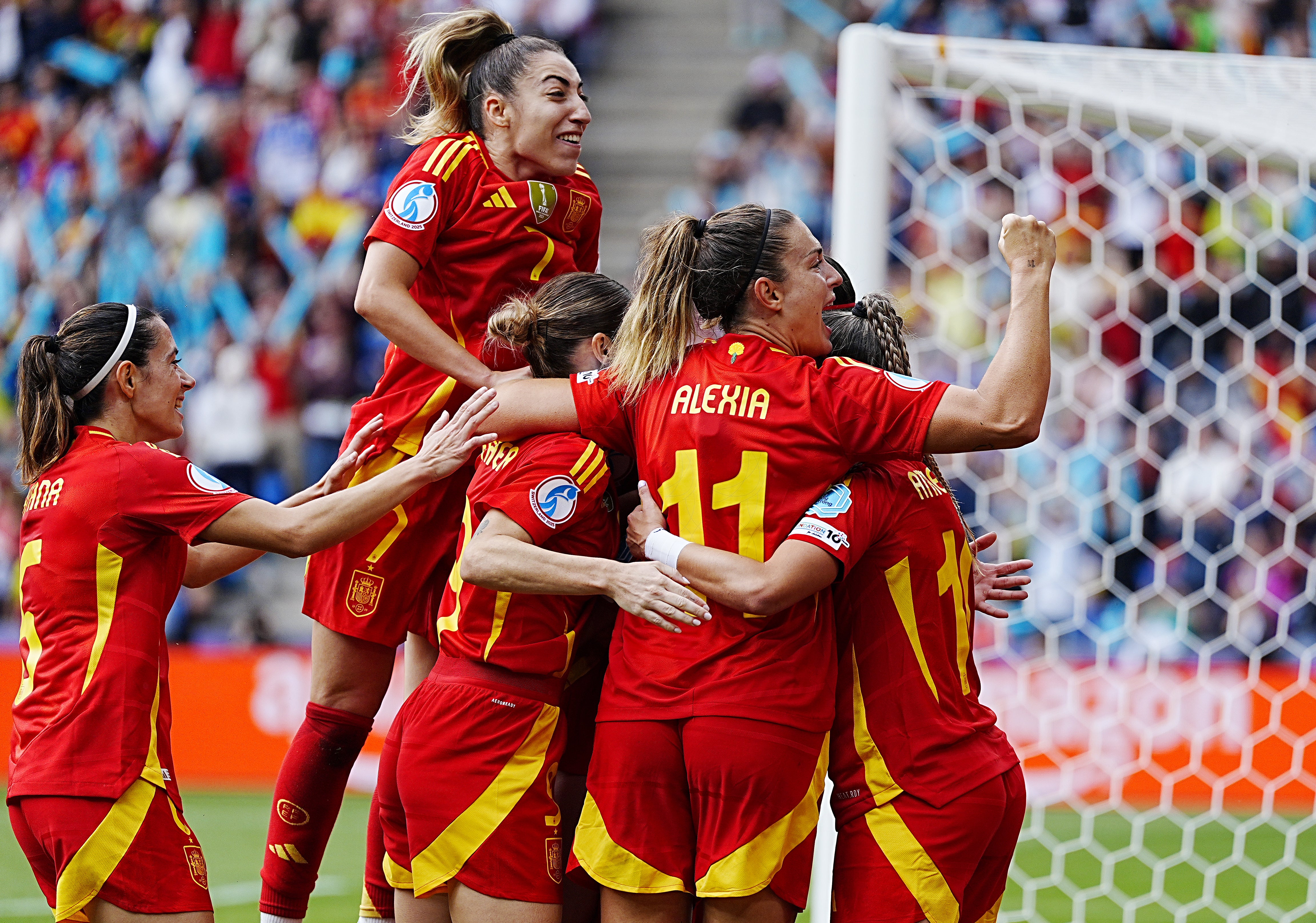 Spain’s Mariona Caldentey (hidden) celebrates with Alexia Putellas