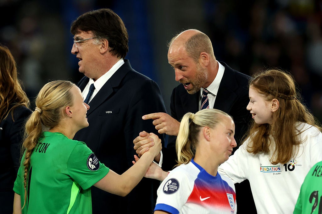 Hannah Hampton of England shakes hands with Prince William