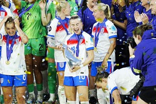 England’s Chloe Kelly celebrates with the trophy (Peter Byrne/PA)