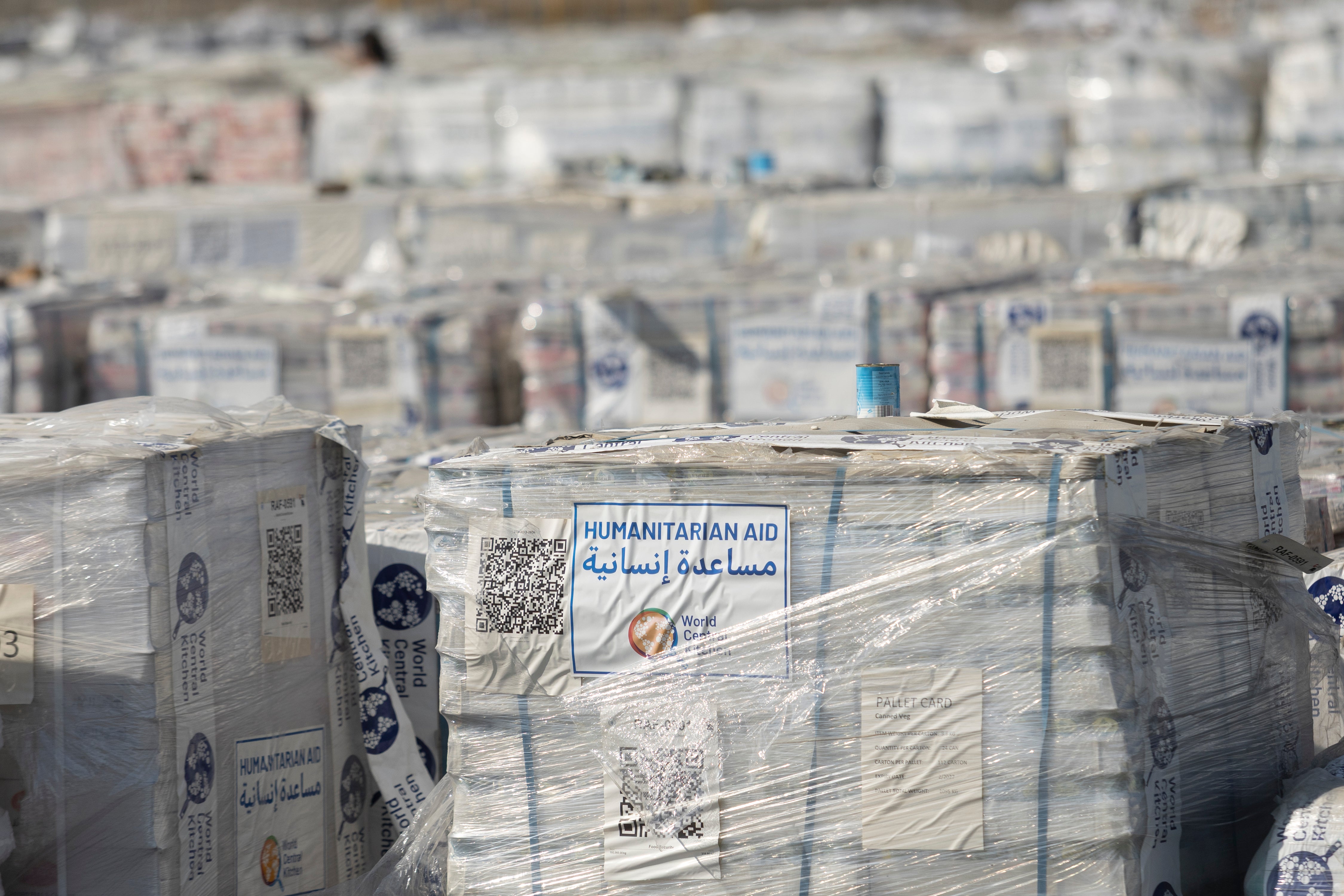 Humanitarian aid packages waiting to be picked up on the Palestinian side of the Kerem Shalom Crossing Point on July 24, 2025 in Kerem Shalom, Gaza Strip