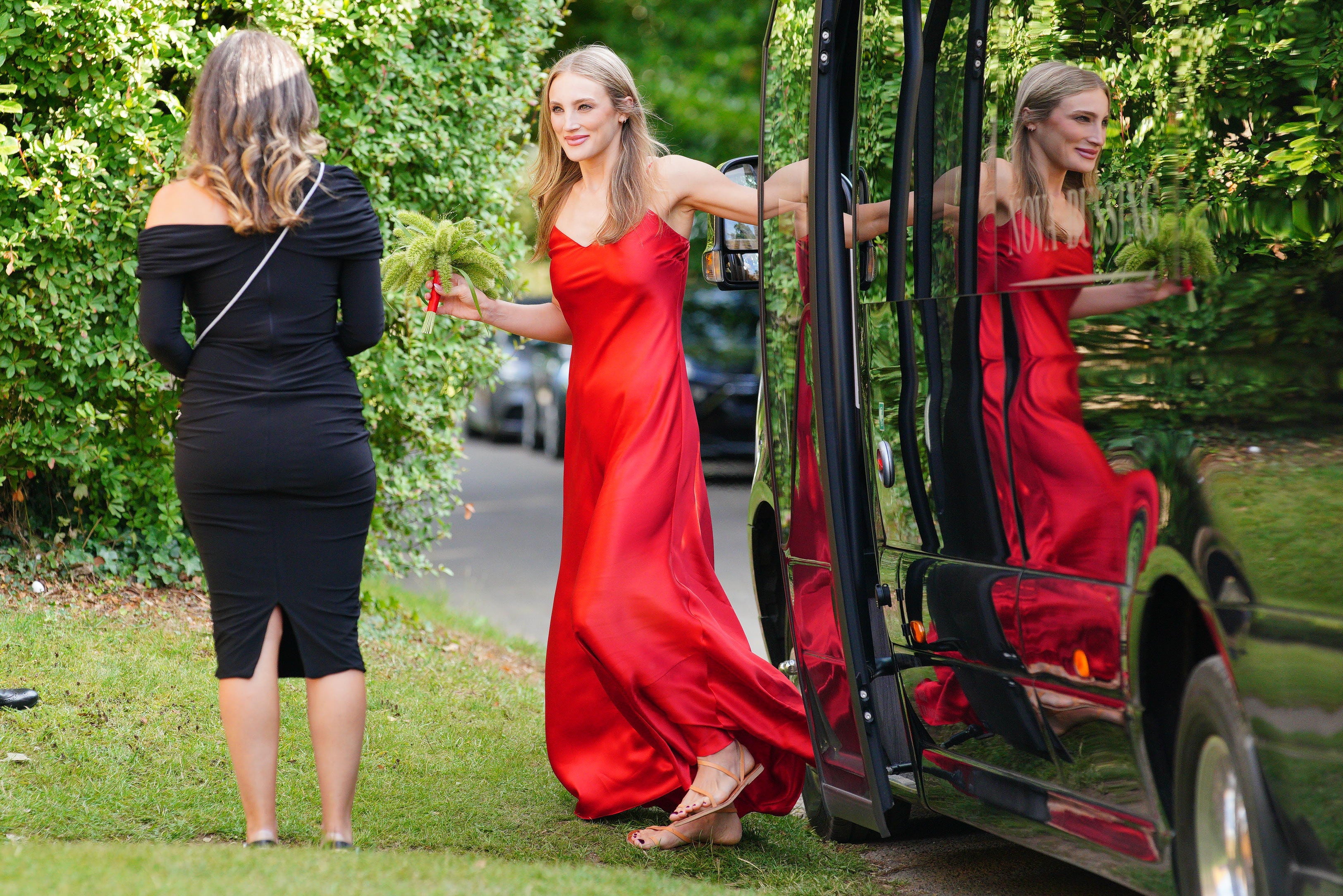 Bridesmaid Jessica Springsteen, the daughter of musician Bruce Springsteen, attends the wedding of Eve Jobs and Harry Charles