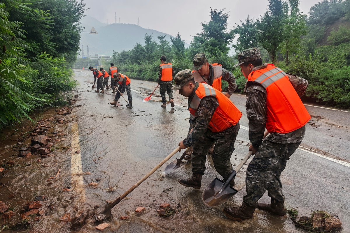 Heavy rains in northern China kill 4 as Beijing and neighboring areas issue flood warnings