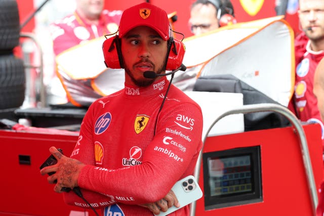 Ferrari driver Lewis Hamilton went to see George Russell after Sunday’s race (Yves Herman/AP)