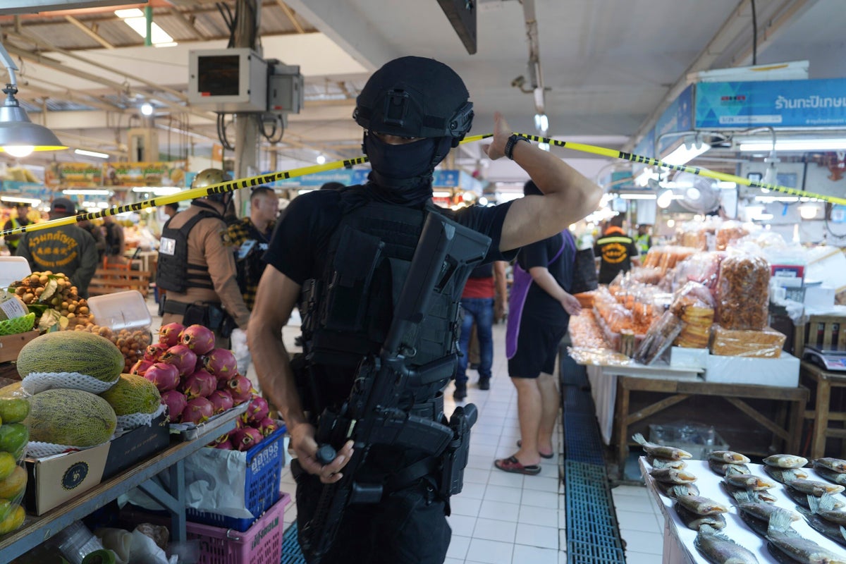 Gunman with a grudge kills 5 and wounds 2 at a Bangkok market before killing himself, police say